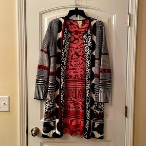 Sweater-knee length.  Fits small and medium.  36’ from shoulder to hem